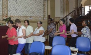 sisters dancing conga line, cropped