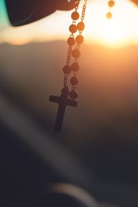 silhouette-photography-of-hanging-rosary-2081128
