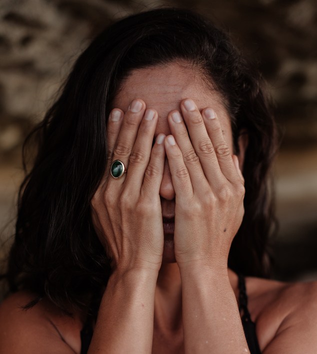 photo-of-woman-covering-her-face-3327126
