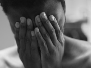 gray-scale-photo-of-topless-man-covering-face-235355 edited